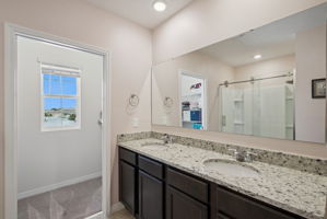 Dual sinks, dual closets, Granite counter tops and wood cabinets