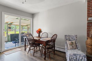 Sliders to enclosed porch from dining area