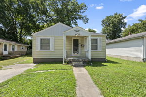 Front of home with private driveway