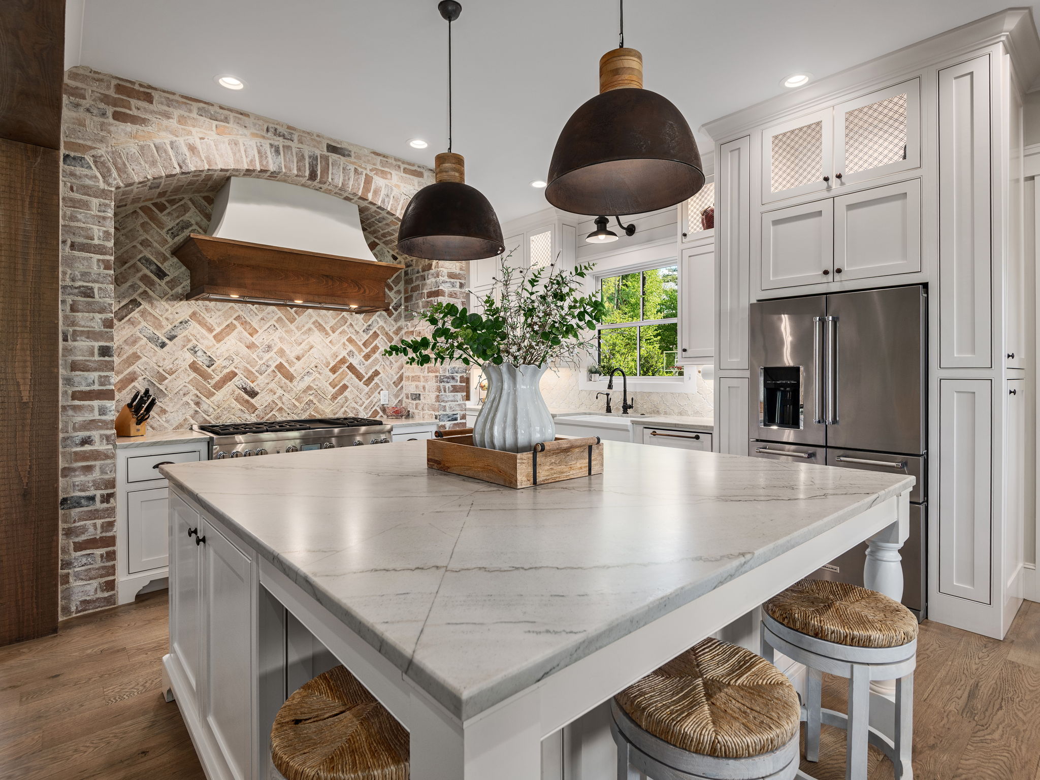 Custom cabinets, seamless quartzite island counter