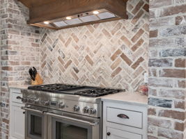 Exposed brick oven nook for the Thermador oven/range