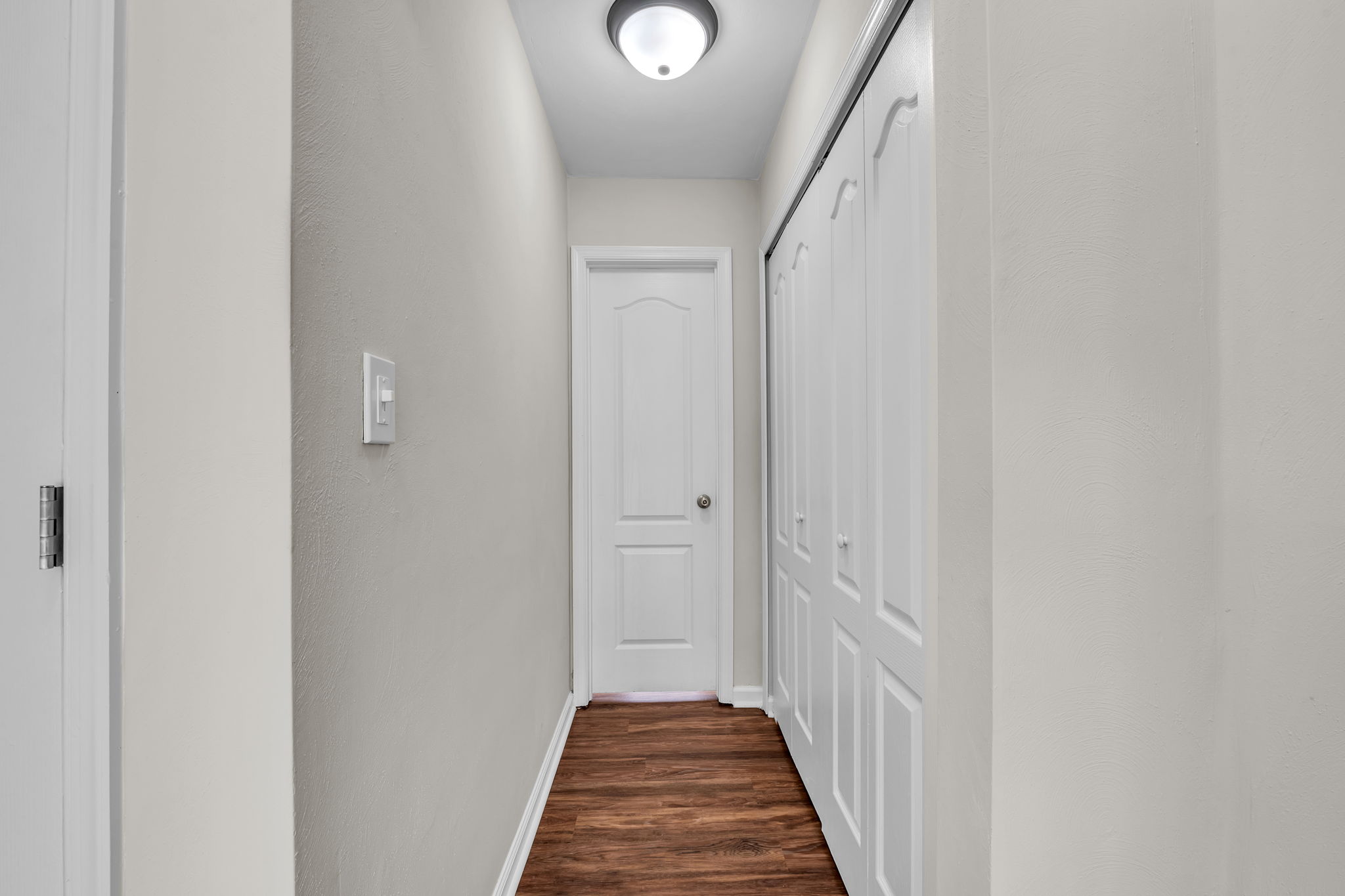 Hall to Laundry and Half Bathroom