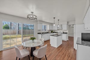 Open Kitchen w/ Eat-in ARea virtually staged.jpeg