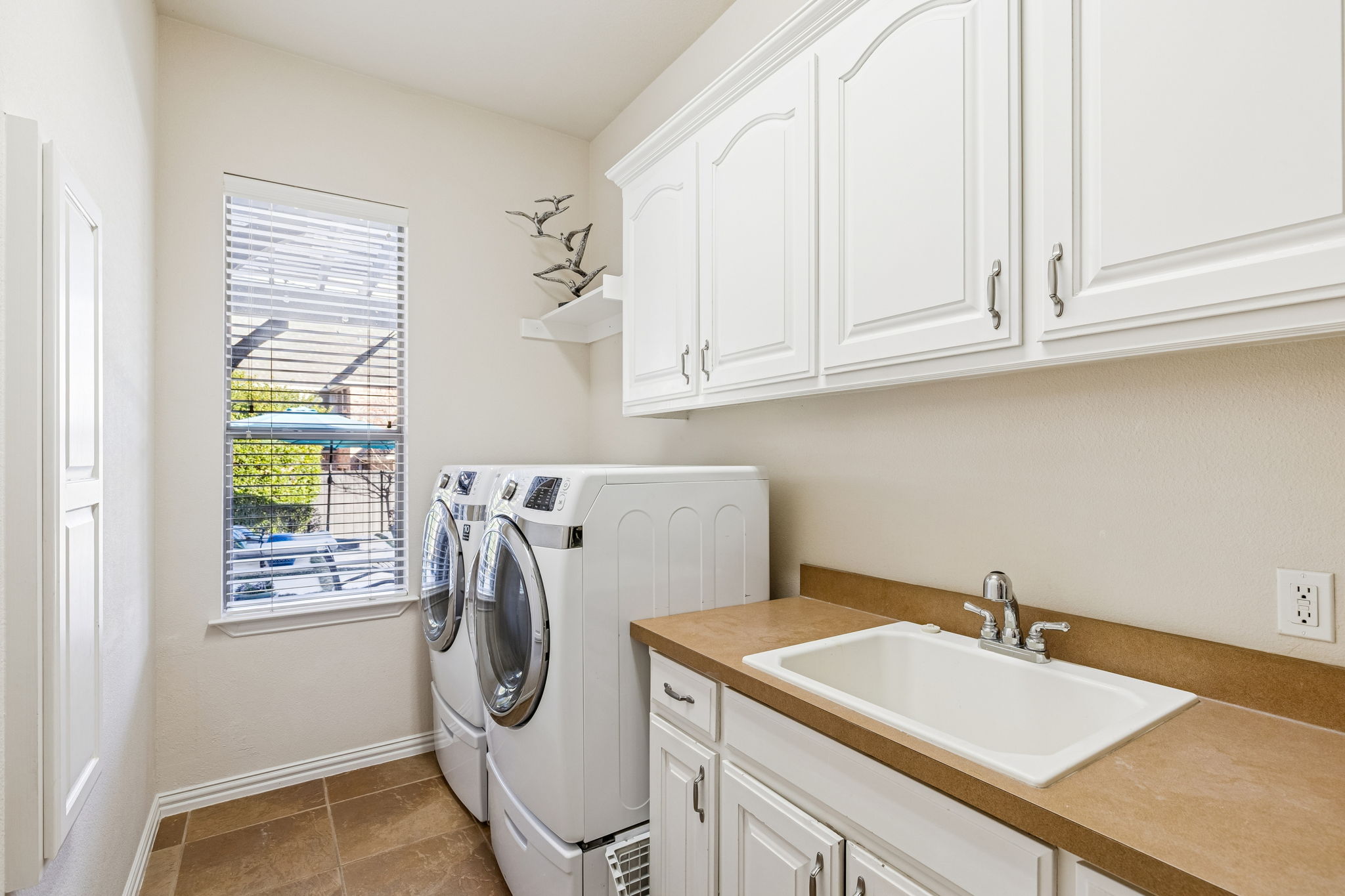 Spacious Utility with room with plenty of storage space