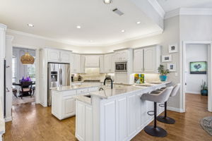 Large open updated kitchiten with Taj Mahal countertops