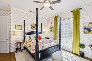 Another view of this beautifully decorated secondary bedroom