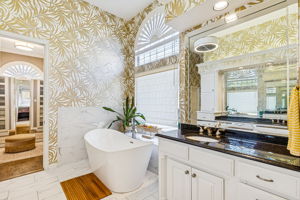 This primary bathroom is a decorators dream, free standing tub, seperate vanities