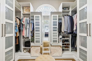 Large primary closet has excellent space for organzing all your wardrobe