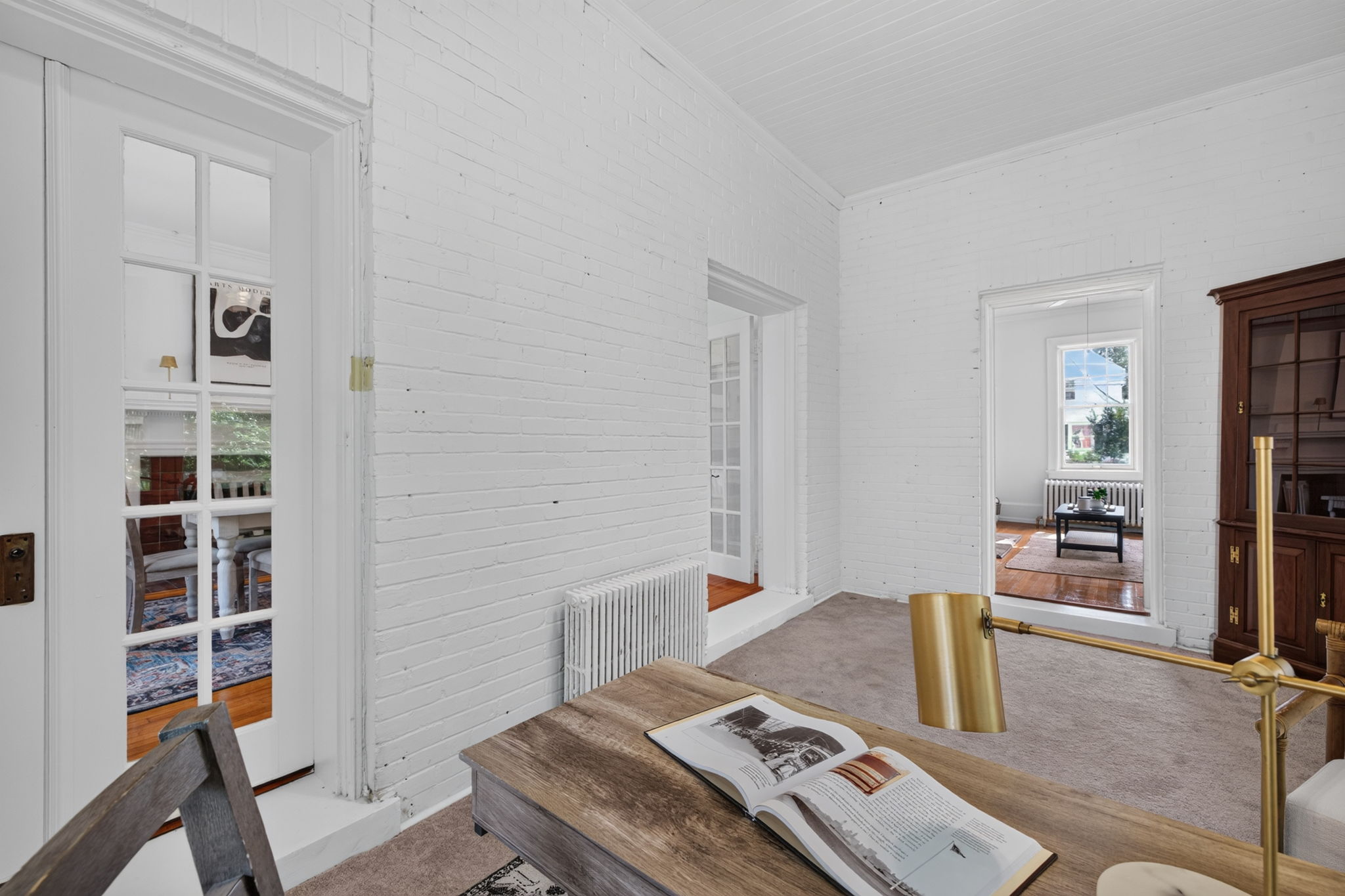 brick wall with dual french doors