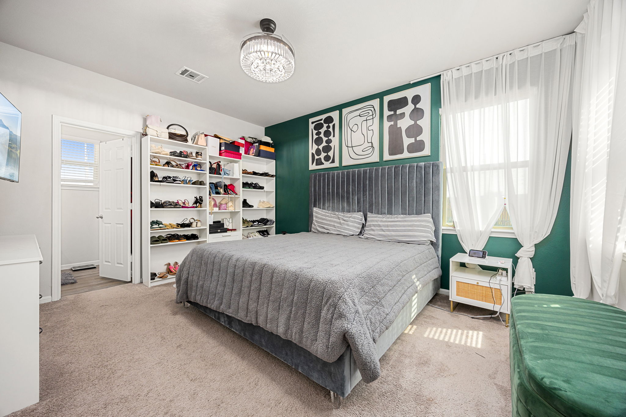 Primary Bedroom with decorative lighting