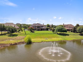 Backyard flows seamlessly to Pond