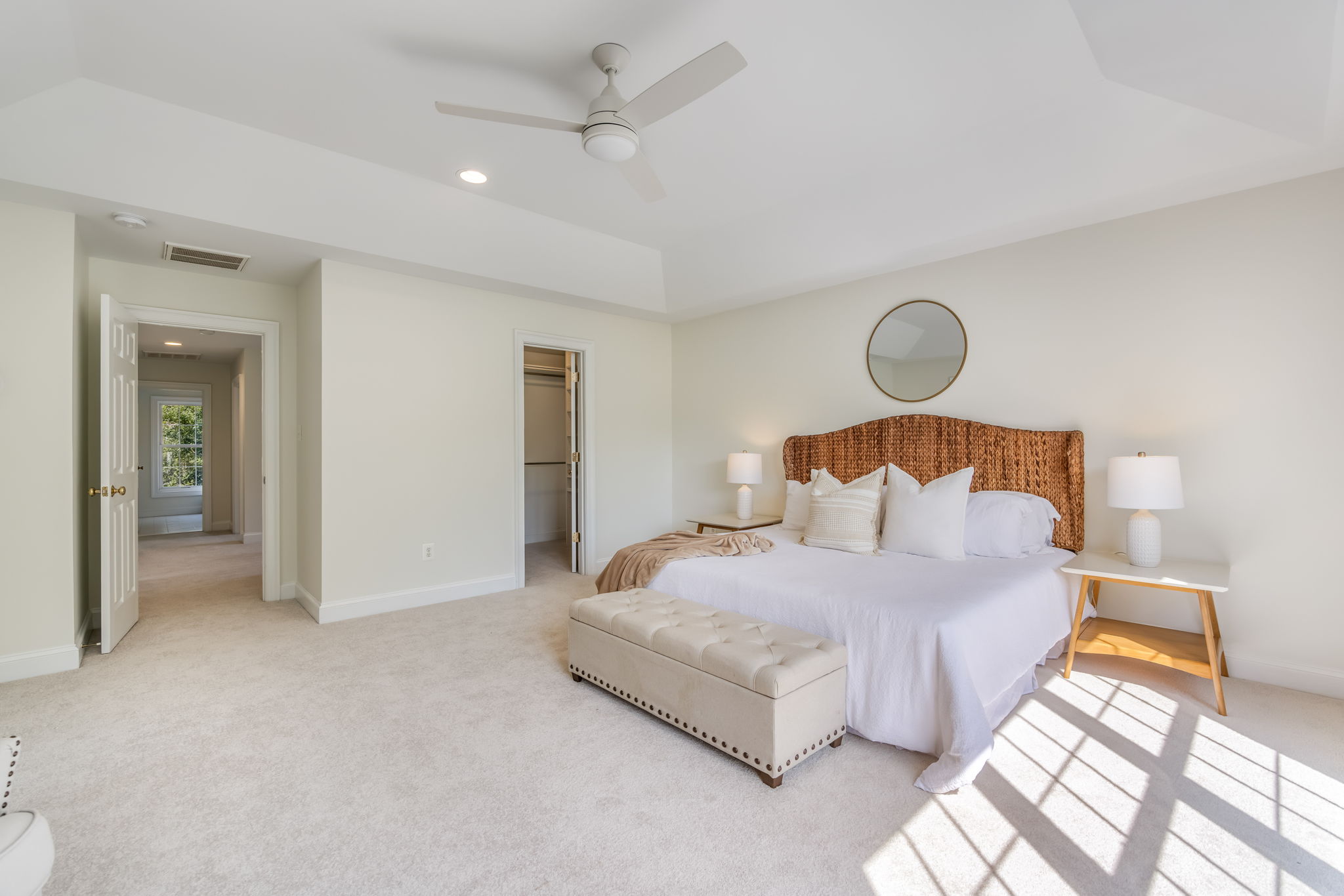 Expansive Primary Bedroom with Tray Ceiling