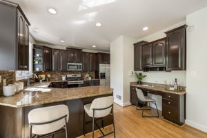 Updated Kitchen with Breakfast Bar & Built-in Desk