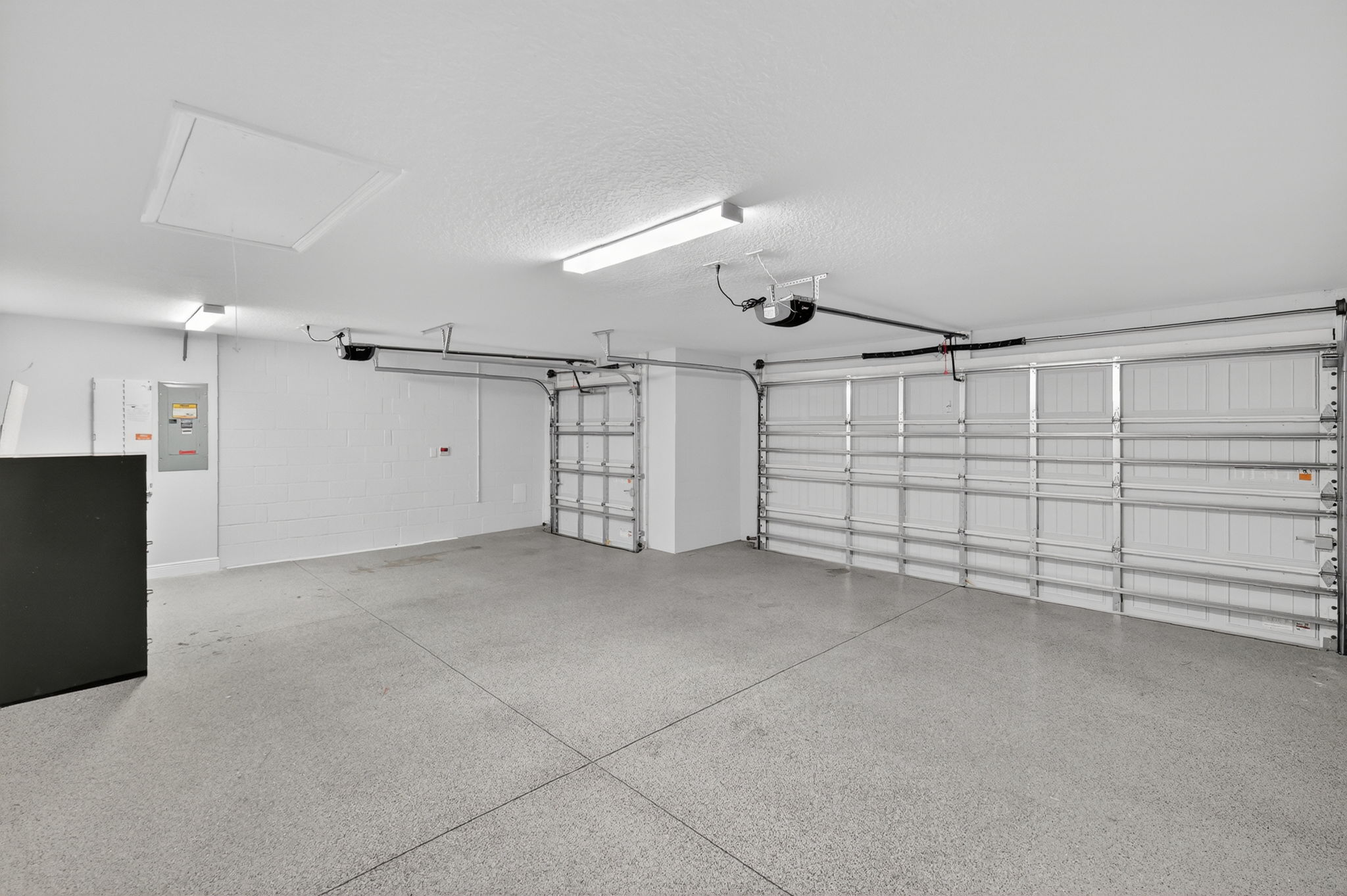 Expansive 677sf Two Car + Golf Cart Garage