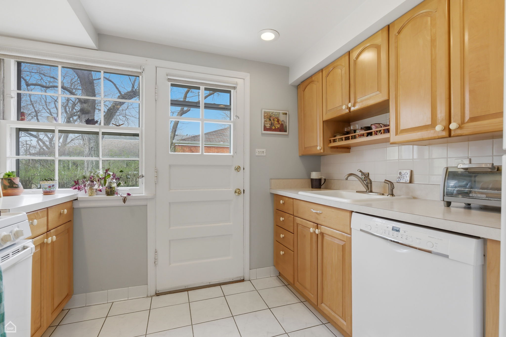 Step out to shared backyard and detached garage