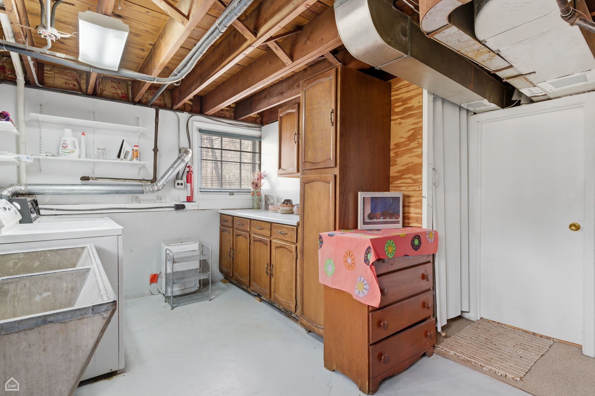 Large laundry/utility room with storage