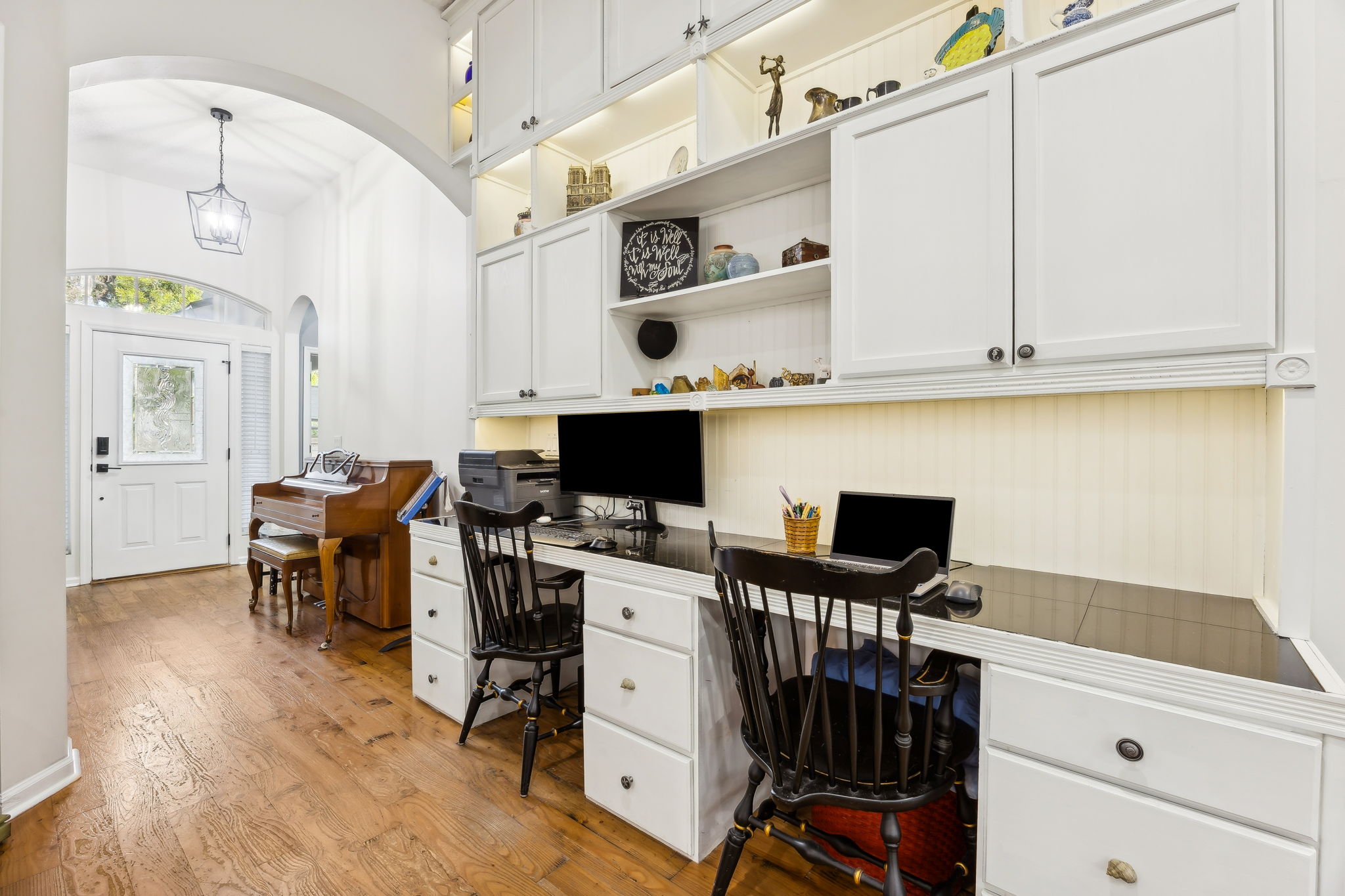 The built-in desk area offers a functional spot for work, study