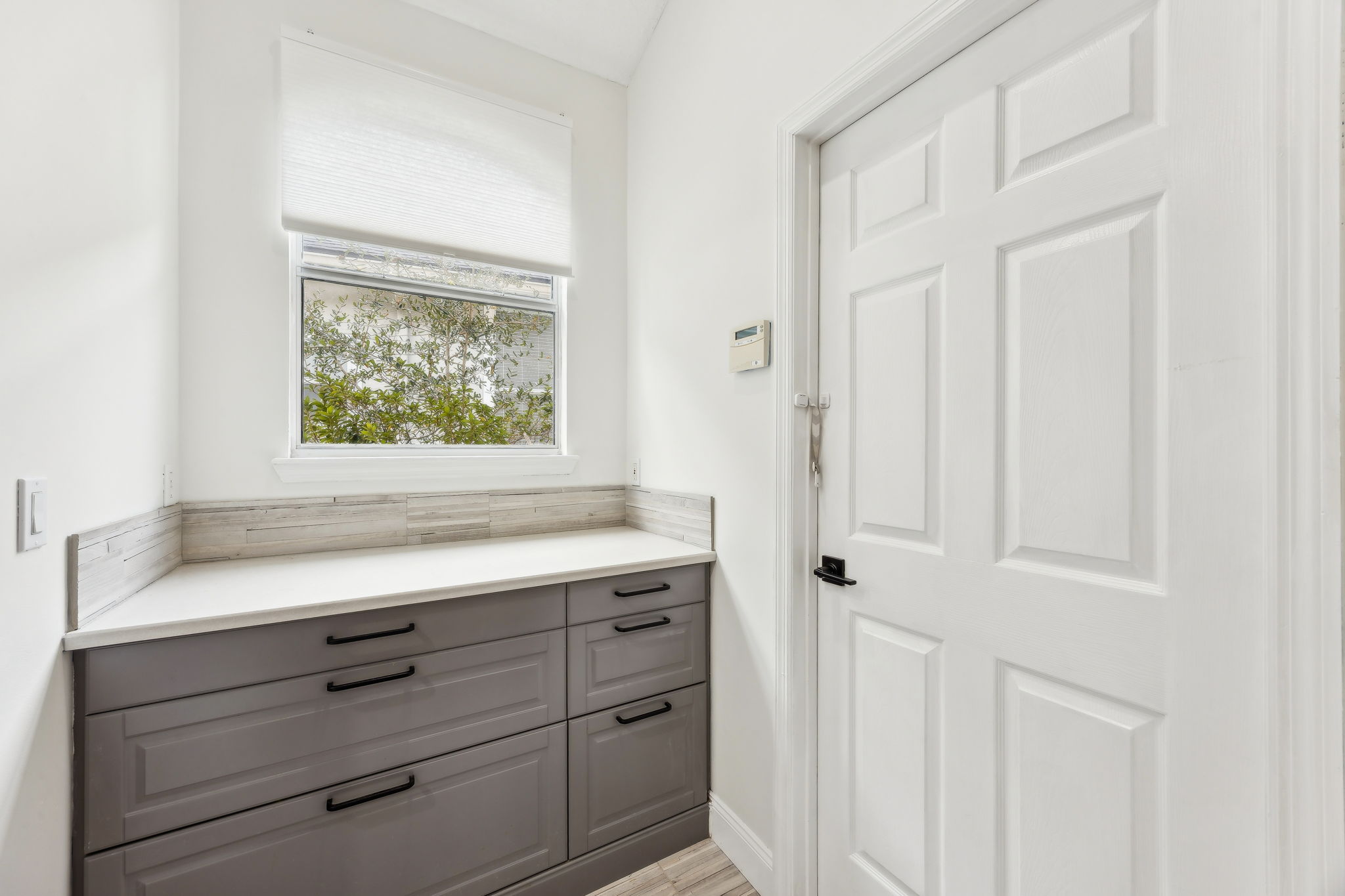 This versatile space serves as an organized command center