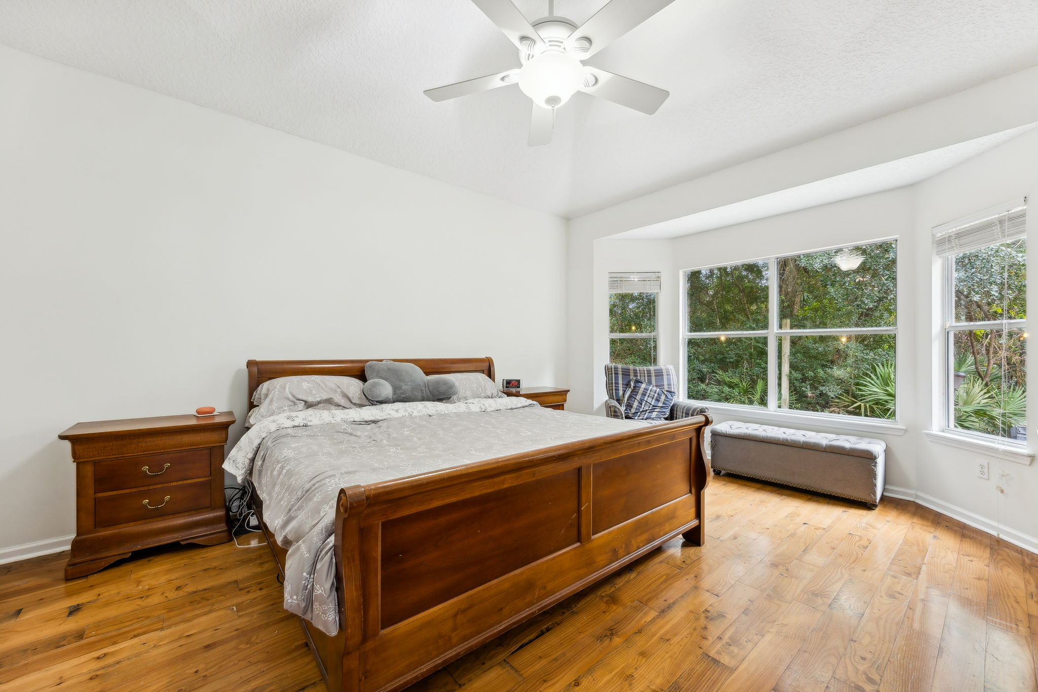 The primary bedroom is a large, roomy space.