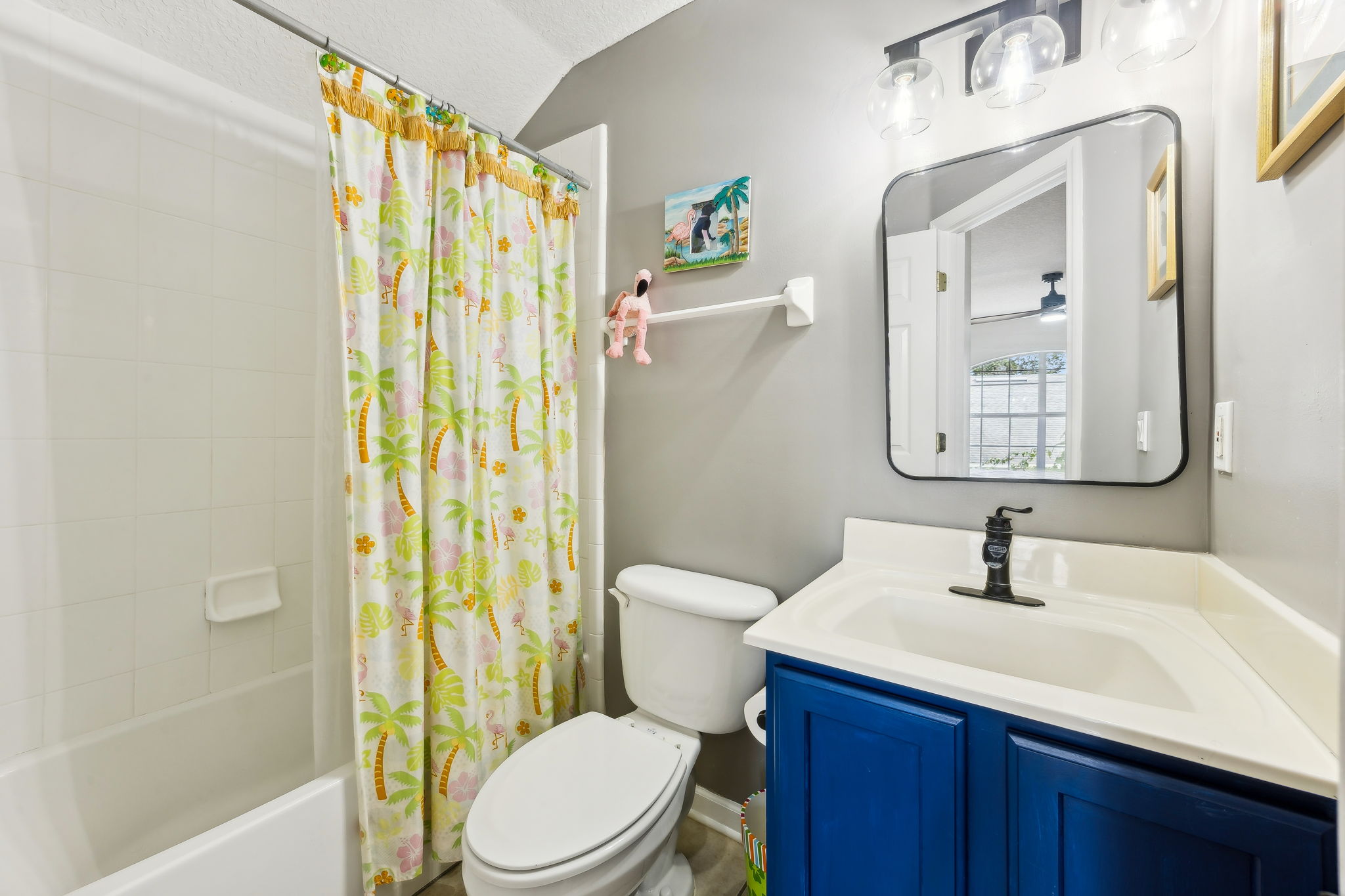 A full bathroom completes the space, making it perfectly functional and convenient.
