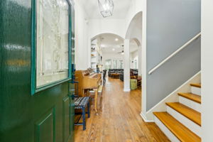 Seamless foyer opening to the living area.