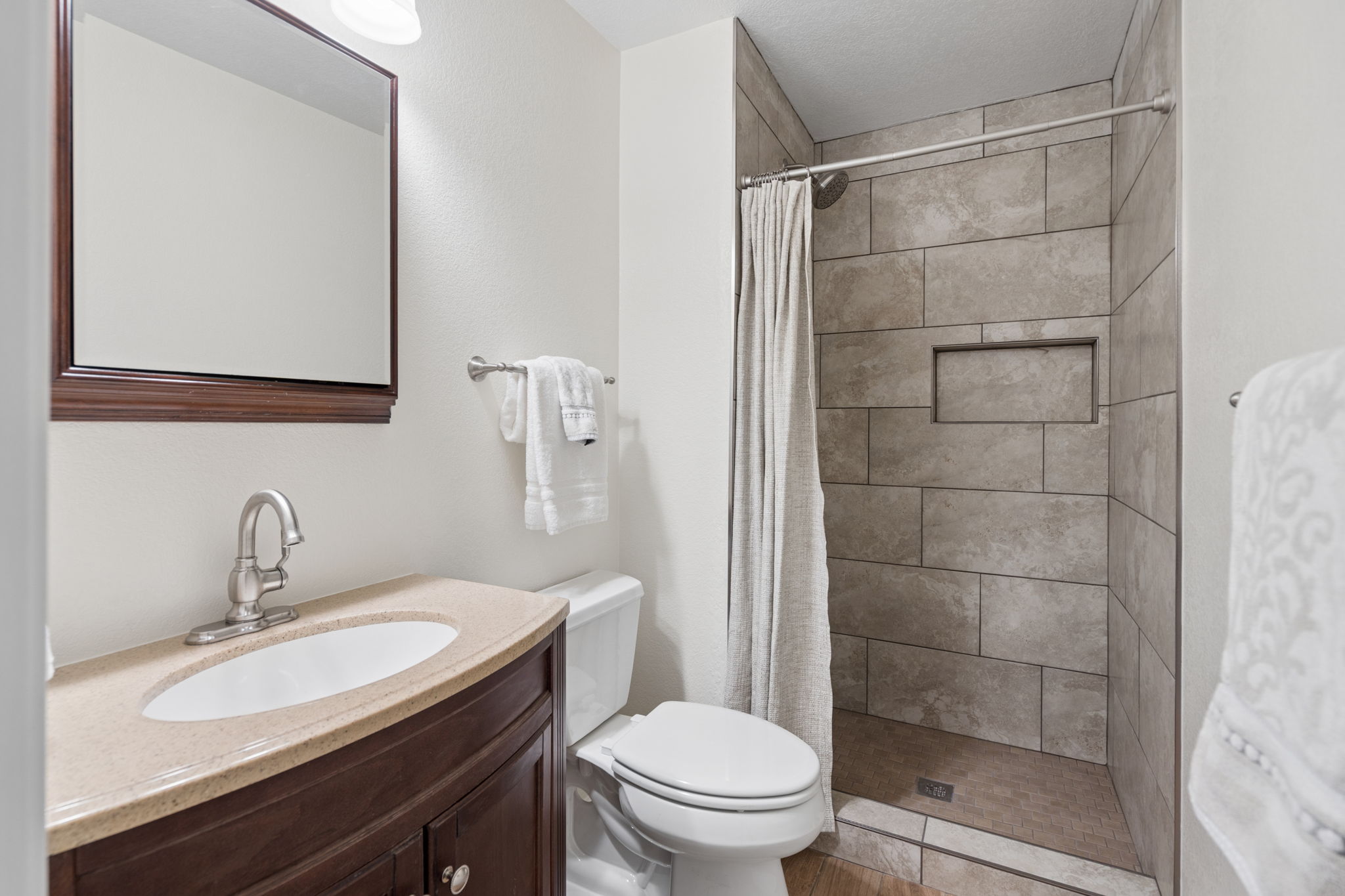 Ensuite Primary Bathroom w/newly tiled shower