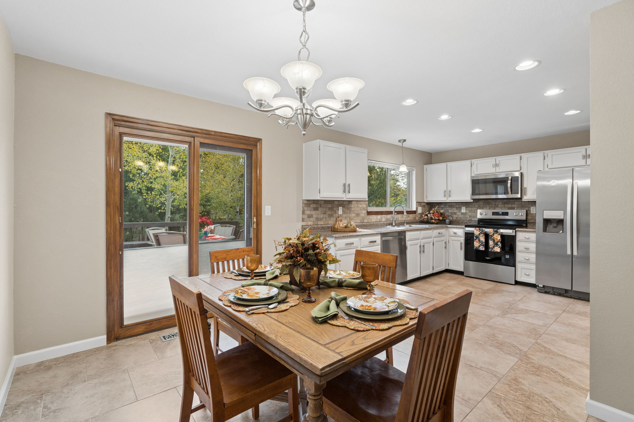 Large dining area w/ walkout to deck