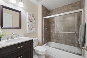 Full Bathroom #1 on main floor w/wide tile flooring