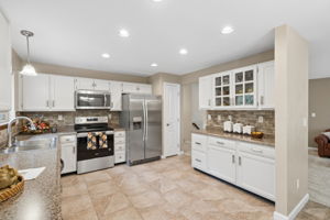 Kitchen has enough room for a kitchen island