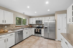 Kitchen has SS appliances & pantry closet