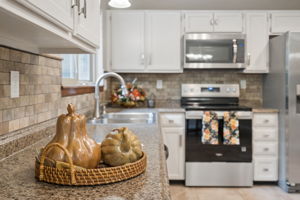Kitchen has solid surface countertops