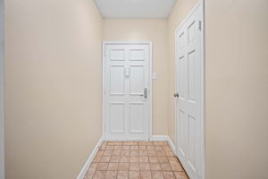 Foyer boasts a spacious closet as well
