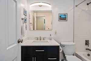 Primary Bath with updated vanity and tile