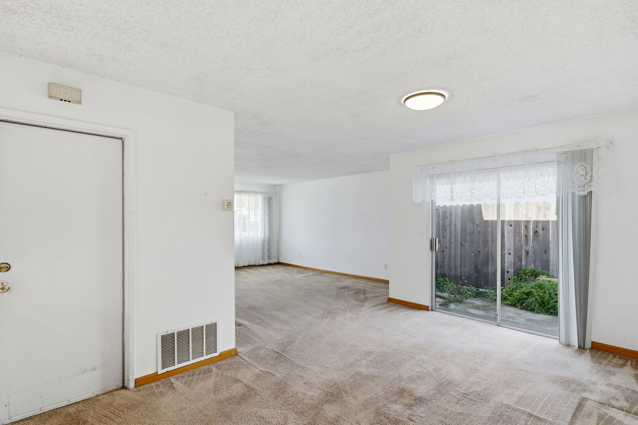 Dining Room, Unstaged (see Door to Garage)