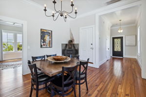 Upon entering, you'll immediately notice the striking original heart pine floors ...