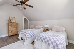 Each guest bedroom boasts its own distinctive vaulted ceiling design.