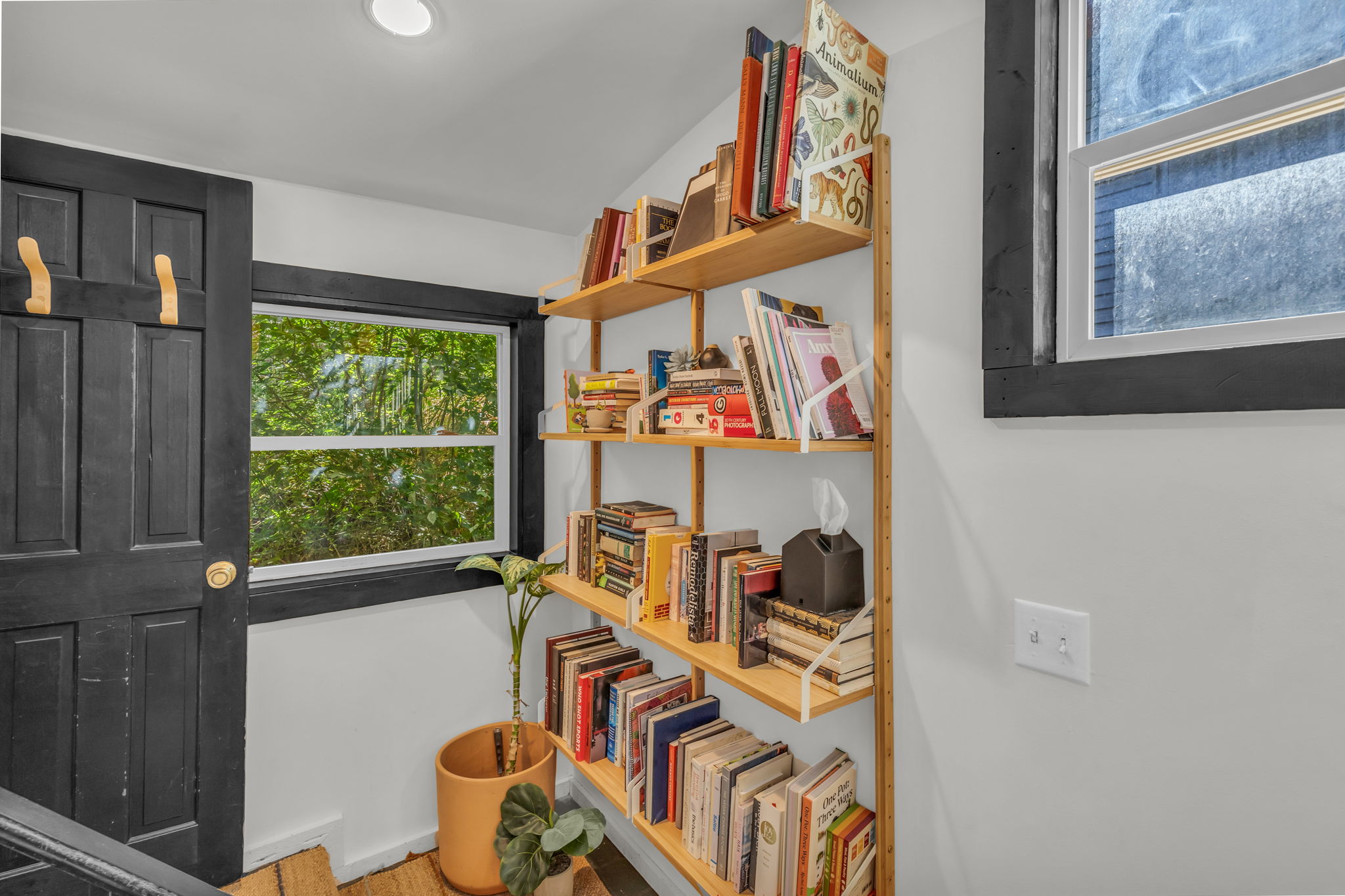 Walkway between primary and upstairs room