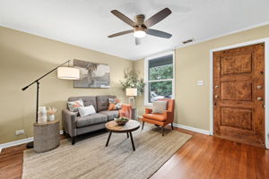 Gorgeous hardwood floors and updated ceiling fans