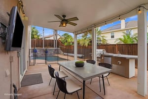 Covered Patio w/Ceiling Fan virtually staged.jpeg