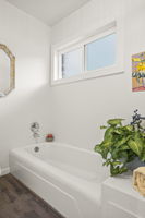 Tub area in hall bathroom