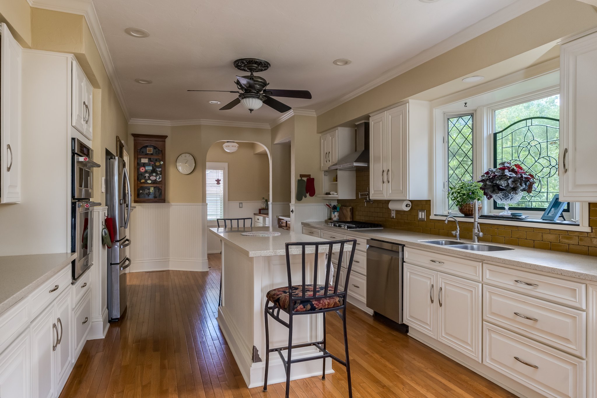 updated kitchen with quartz counter tops and high-end appliances