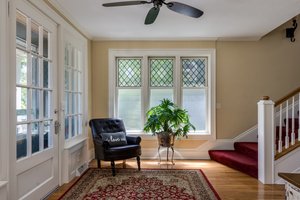 Natural light floods the front entry