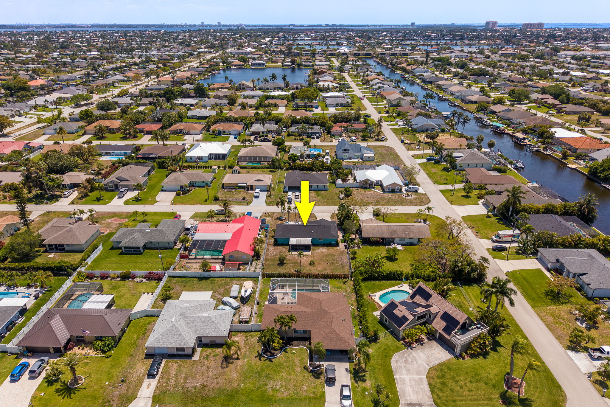 Facing South with nearby Tarpon Point Marina visible in the distance