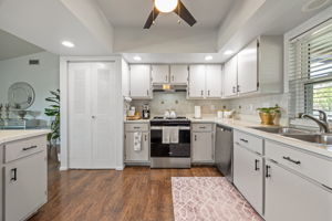 New stainless steel dishwasher, stove, and range hood
