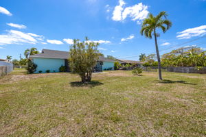 Fenced-In Backyard with room to build a custom pool
