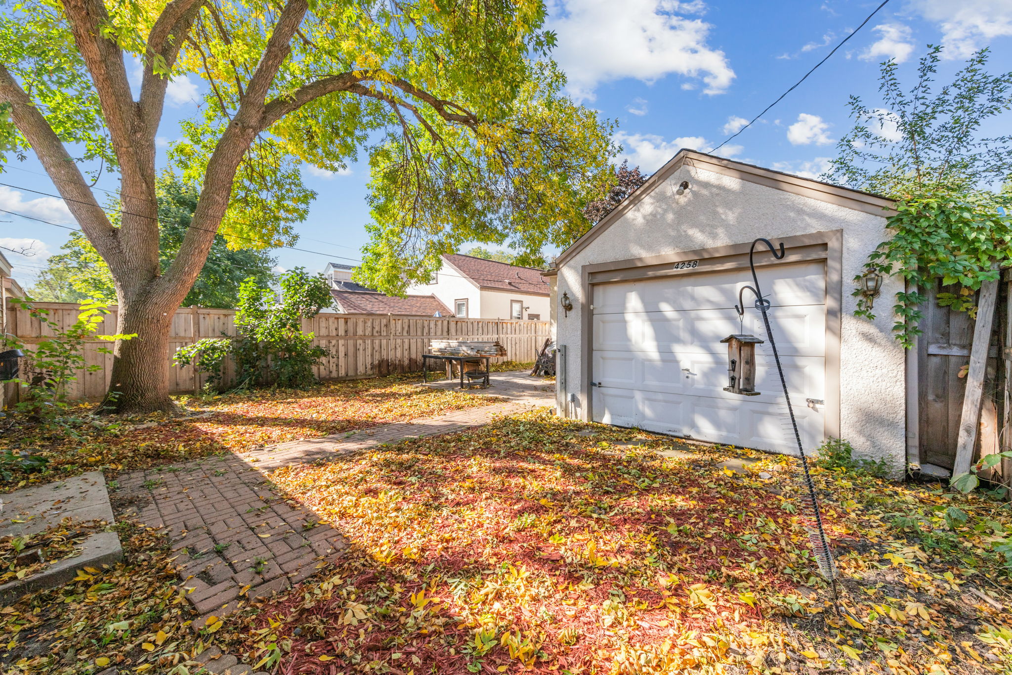 Backyard has one car attached garage
