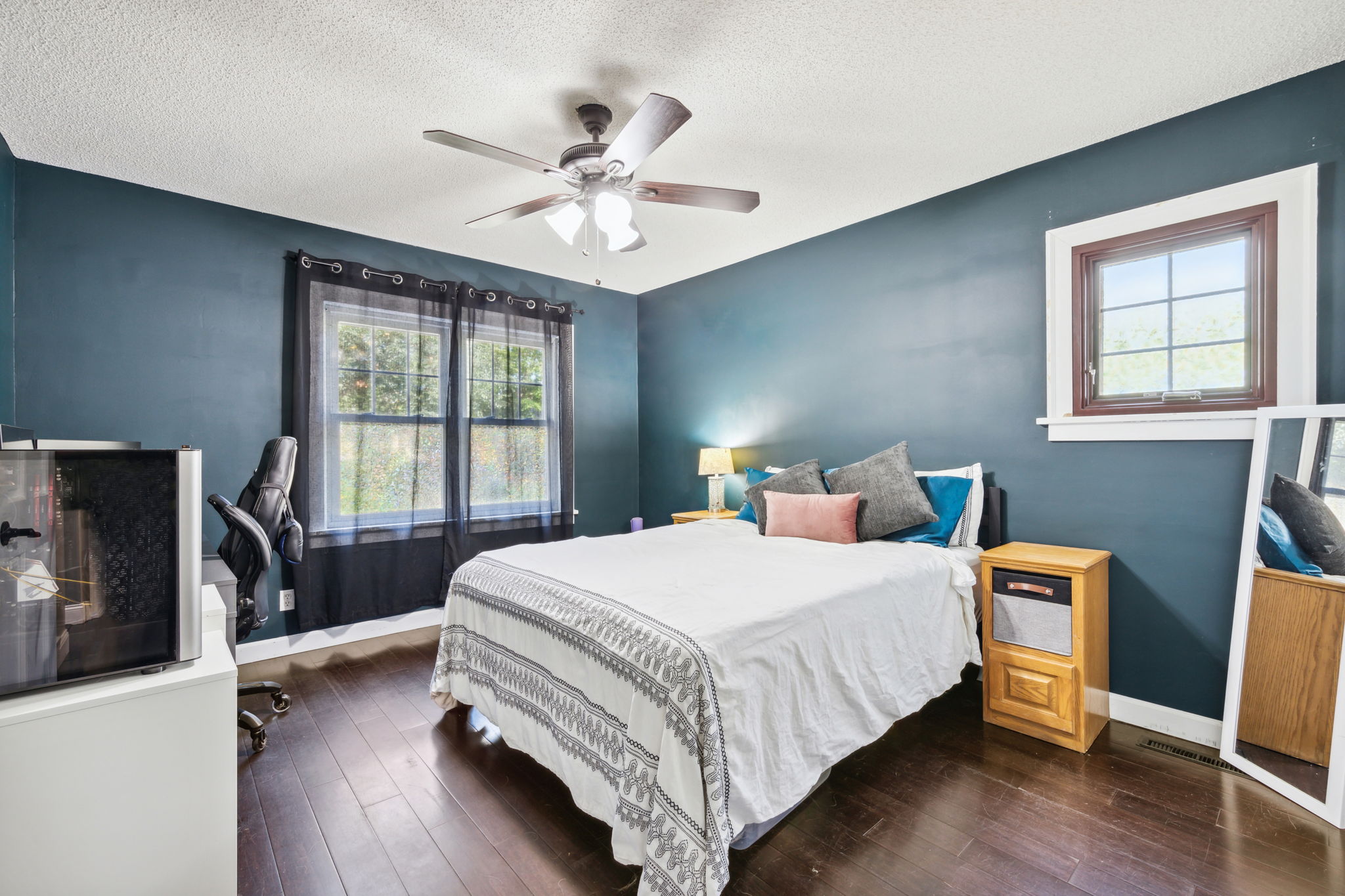 One of two main floor bedrooms (front)