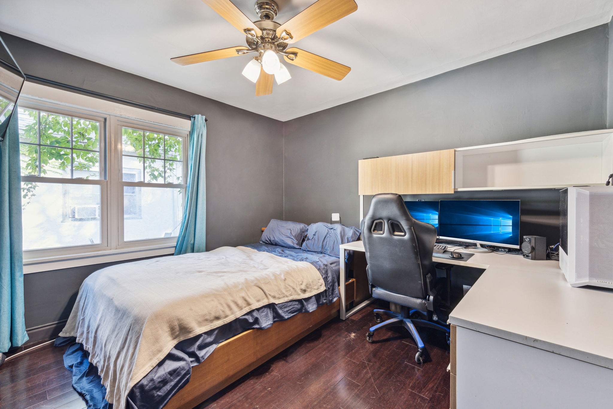 One of two main floor bedrooms (back)