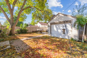 Backyard has one car attached garage
