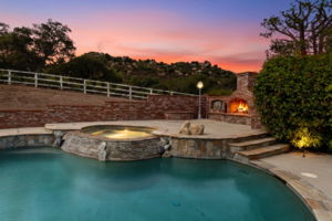 Pool and Spa with outdoor Fireplace